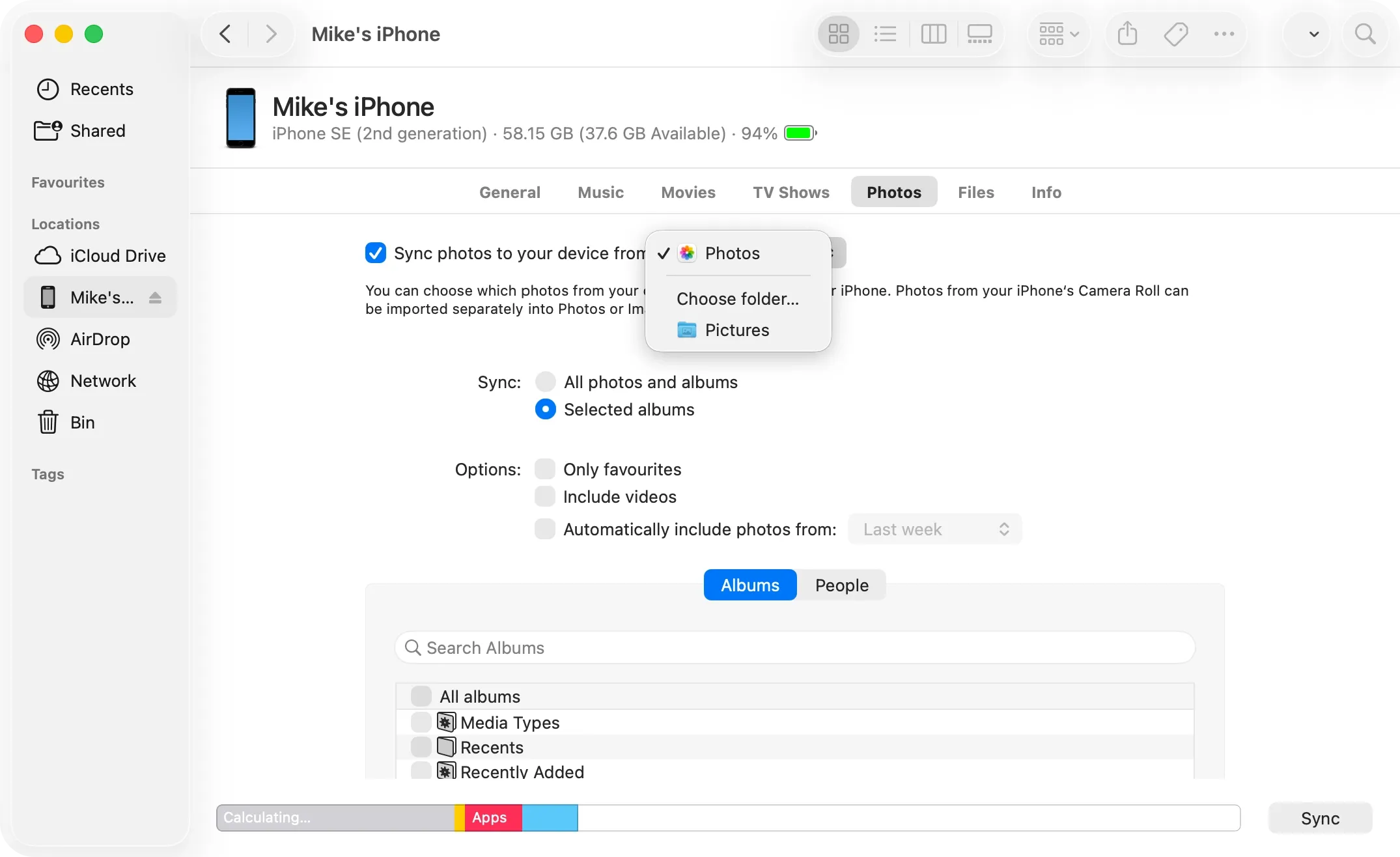 Finder sync panel on macOS, Photos source dropdown open with Photos checked and Choose folder option below.
