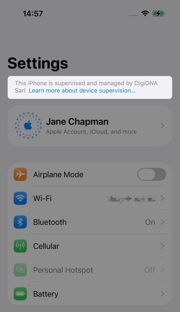iOS Settings view with supervised information highlighted